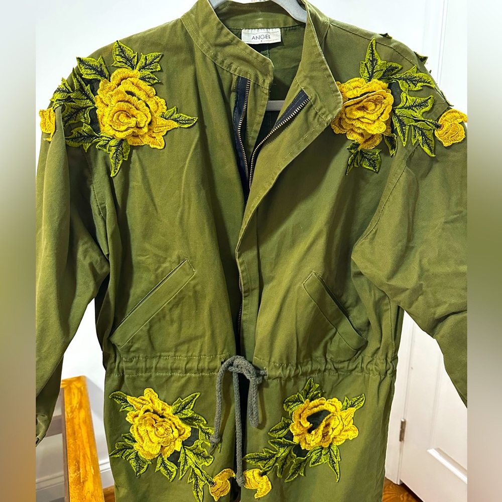 Green jacket with yellow 3D flowers